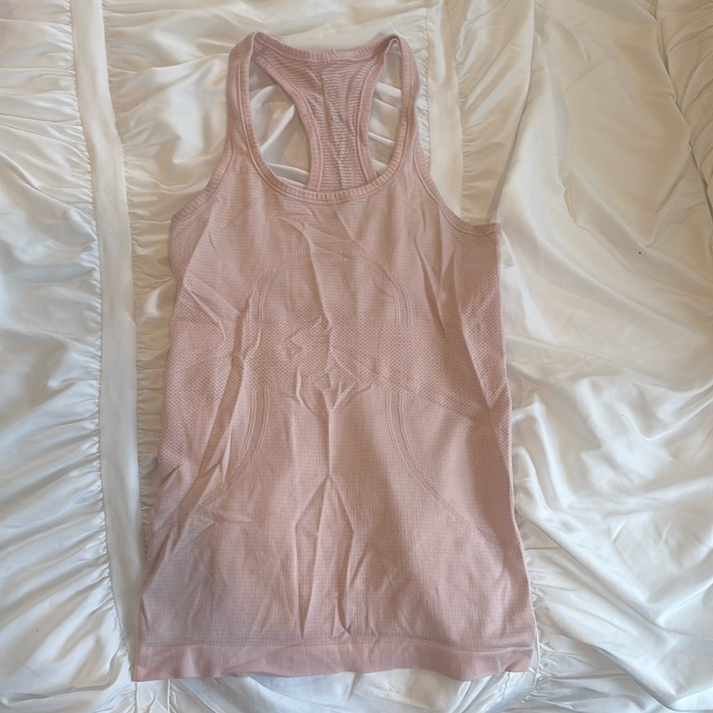 Lululemon pink racerback tank size 4 color light pink